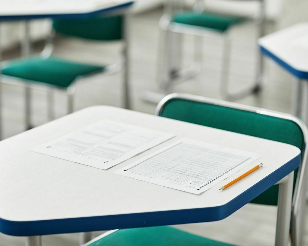 A white exam paper on a desk